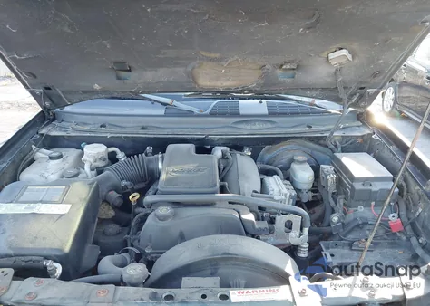 2002 Chevrolet Trailblazer Ltz z USA, uszkodzony, nr VIN 1GNDT13S922352309